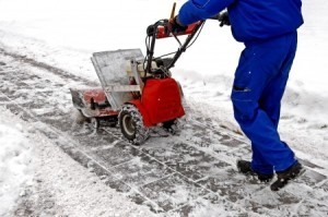 Man Pushing Snow Blower, Inclement Weather Policy