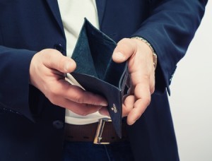 Business Man Holding an Empty Wallet 
